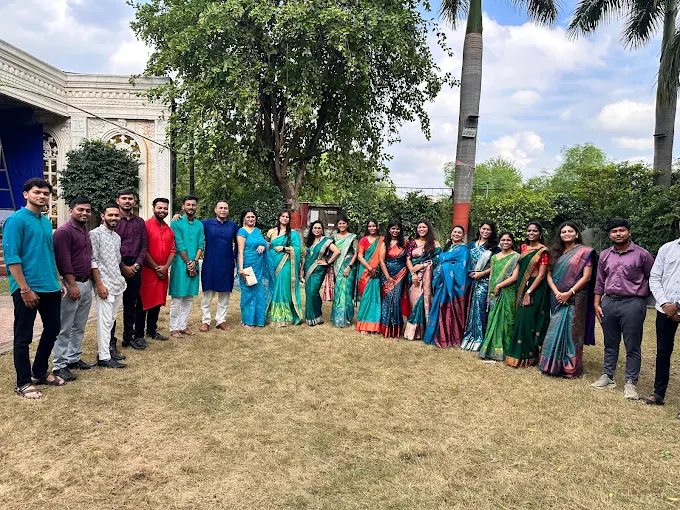 Team members at a festival celebration